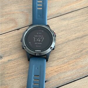 Garmin Blue Smartwatch with Circular Display and Silicone Strap